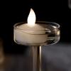 imageAGPtek 12 PCS Floating Candles Waterproof Tea Light Candles Battery Operated Flameless Floating Candles for Centerpieces Wedding Party Decoration  Warm White