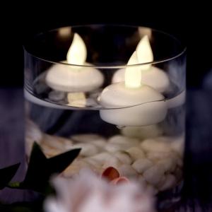 imageAGPtek 12 PCS Floating Candles Waterproof Tea Light Candles Battery Operated Flameless Floating Candles for Centerpieces Wedding Party Decoration  Warm White